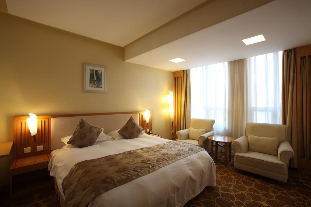 Beijing Wuhuan Hotel Стая снимка