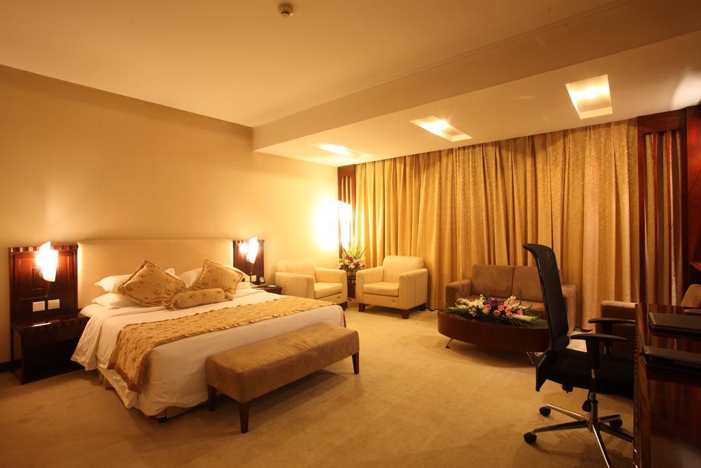 Beijing Wuhuan Hotel Стая снимка
