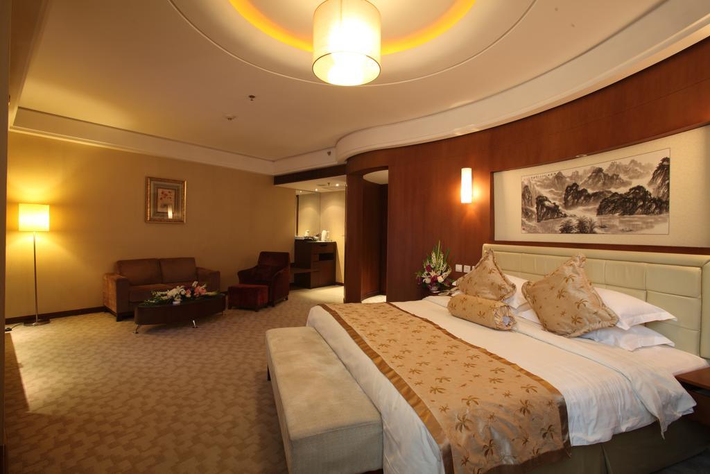 Beijing Wuhuan Hotel Стая снимка