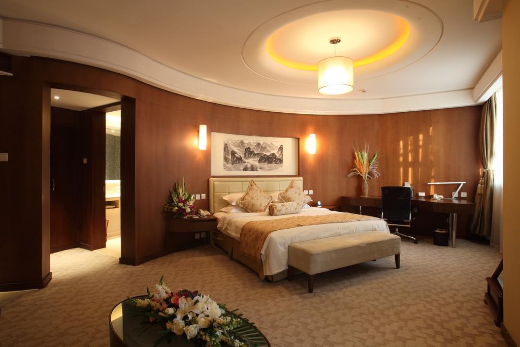 Beijing Wuhuan Hotel Стая снимка