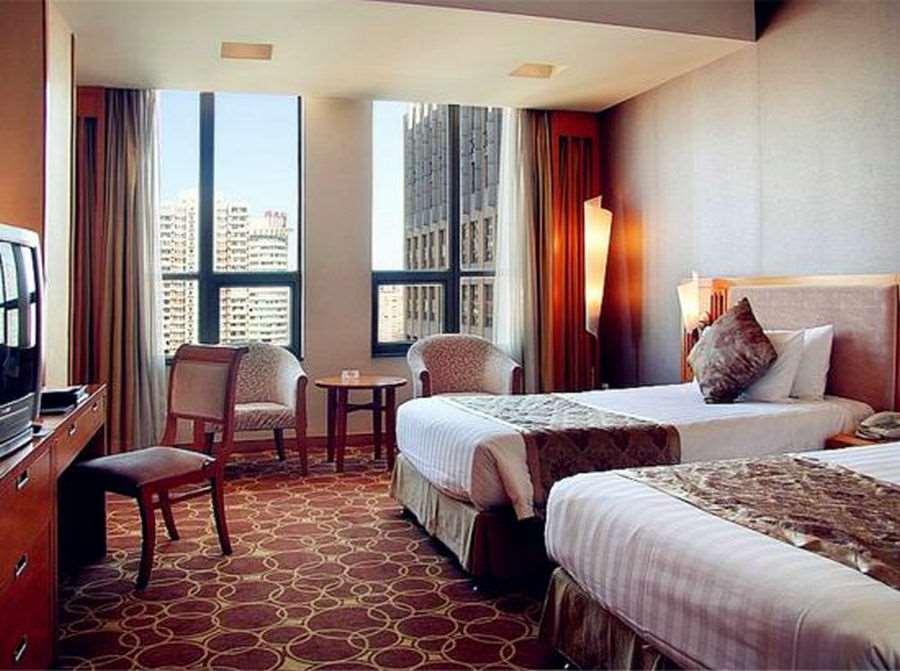Beijing Wuhuan Hotel Стая снимка
