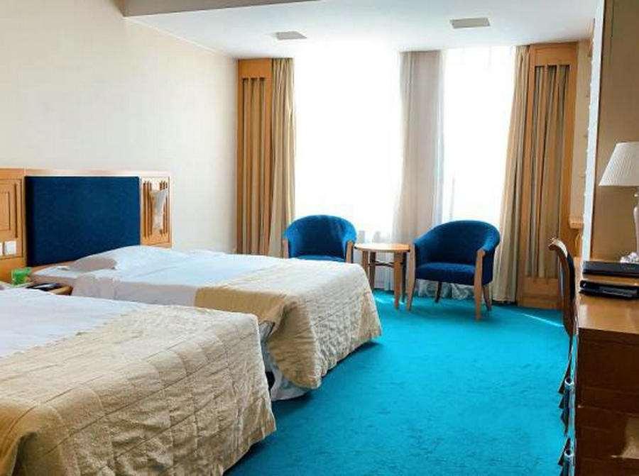 Beijing Wuhuan Hotel Стая снимка