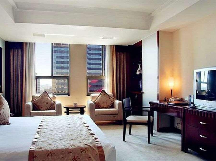 Beijing Wuhuan Hotel Стая снимка