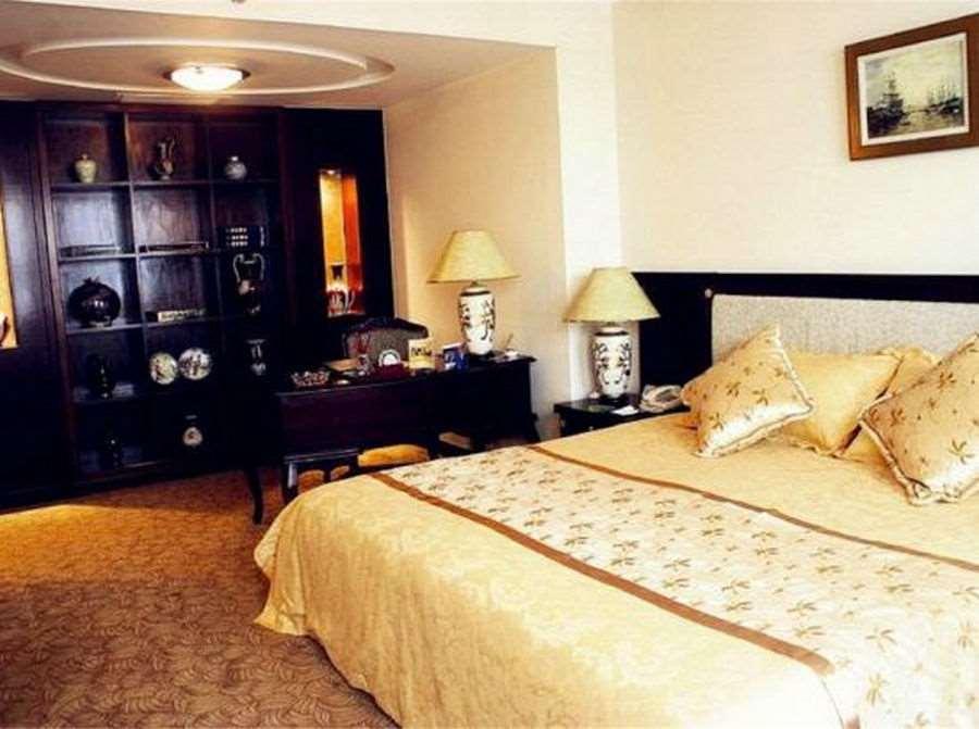 Beijing Wuhuan Hotel Стая снимка